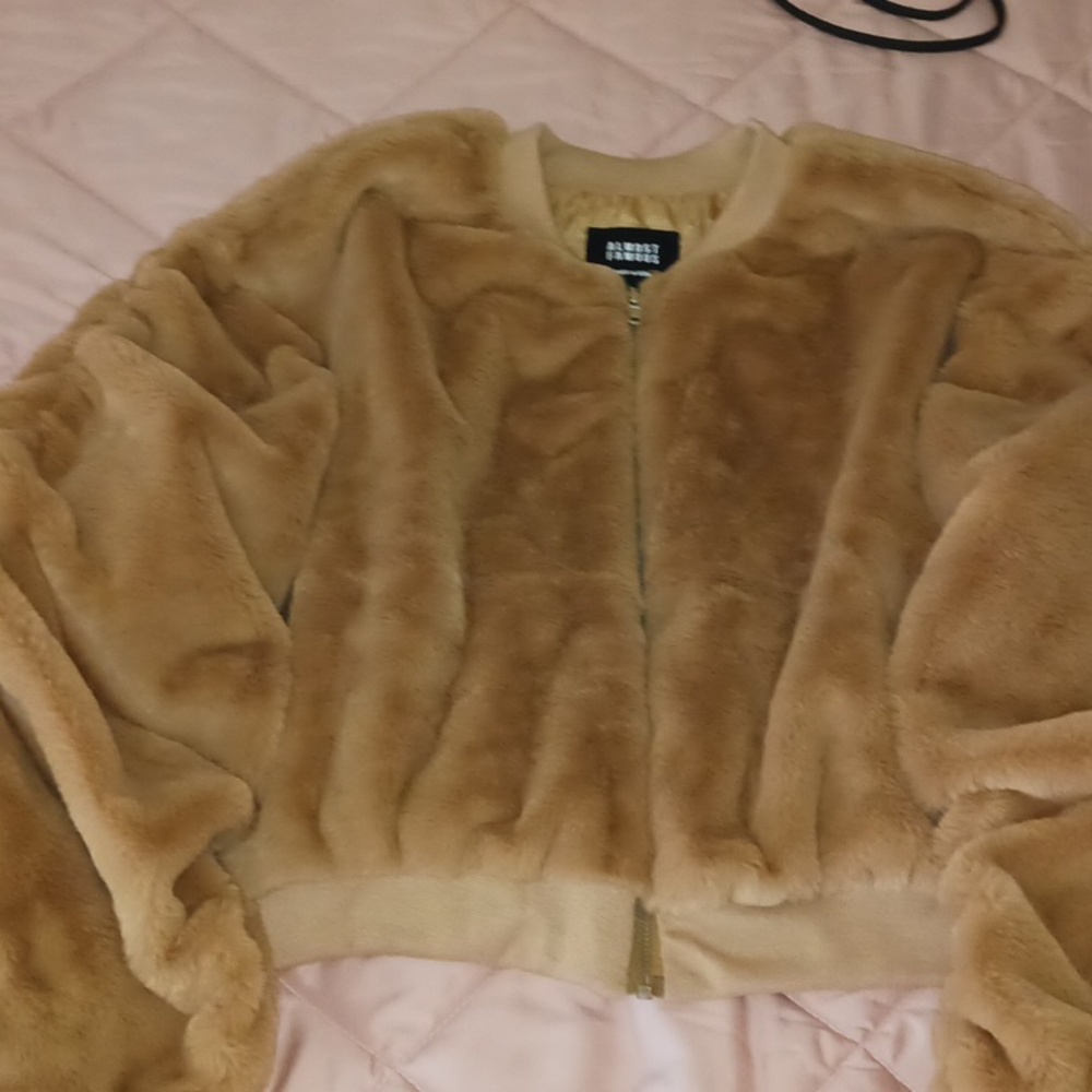 Almost Famous Puffy tan sweater medium in size